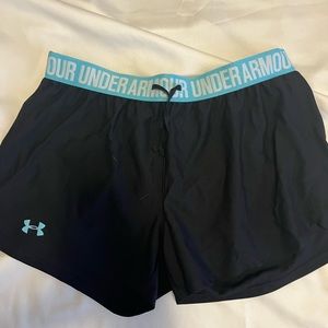 Under Armour women’s shorts black. Medium HeatGear loose